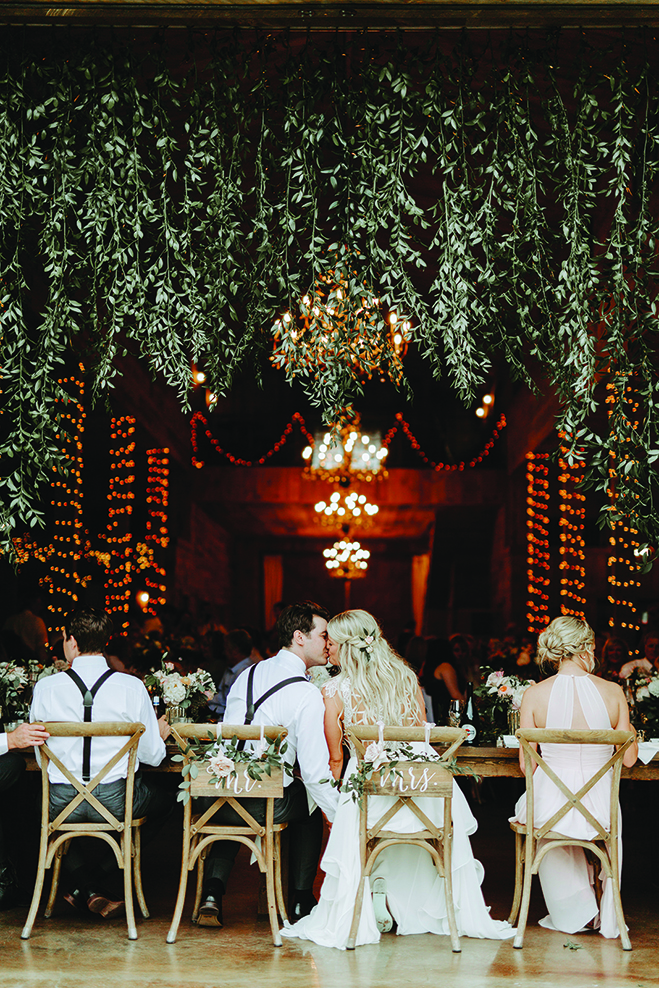 Kate and Lucas kiss during their reception at Creekside Farm Weddings & Events