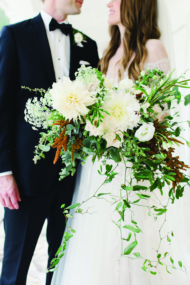 Laura and Rob show off the bouquet.