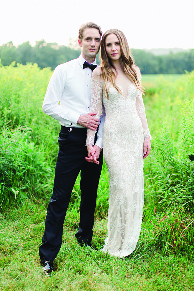 Laura and Rob strike a casual pose at Mayowood Stone Barn