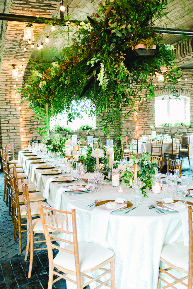 The tables set for the reception at Mayowood Stone Barn