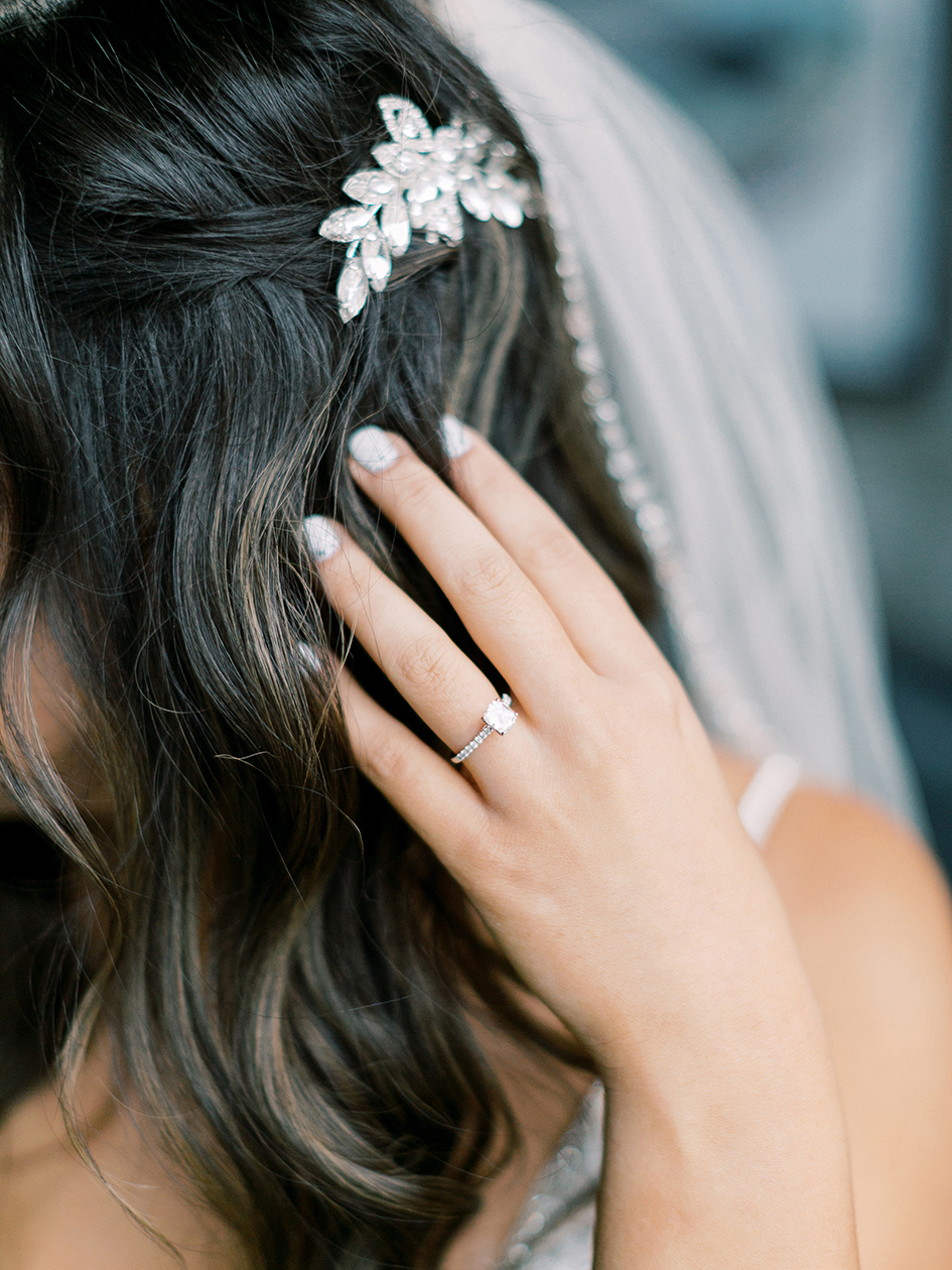 Stephanie shows off her hair and ring.