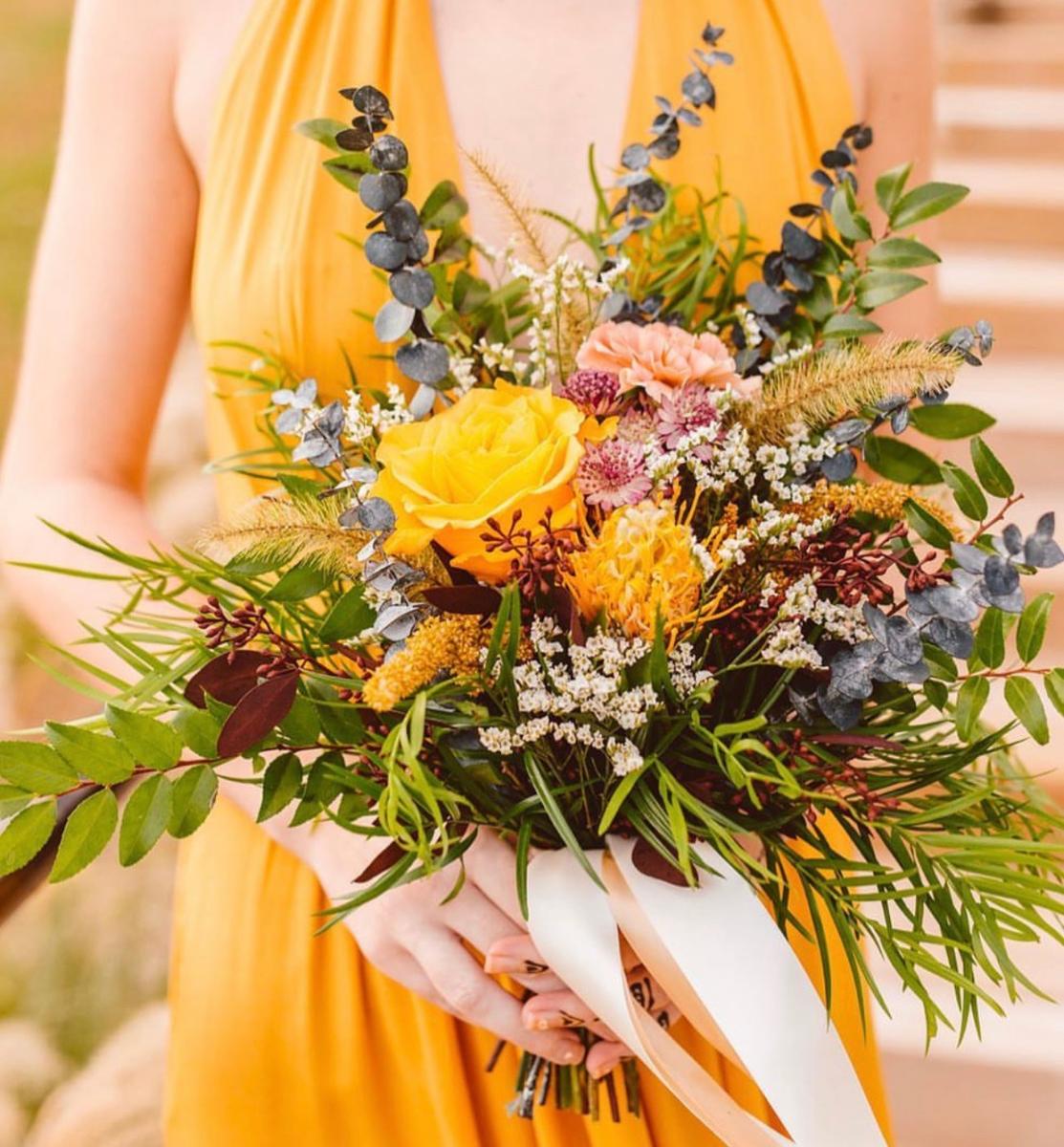 Photo by Brooke Michelle, Florals by JStarr's Flower Barn