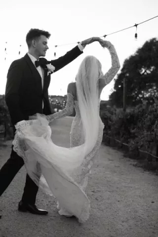 Dillon twirls Brittany on the grounds of Cass Winery