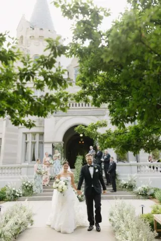 Bride and Groom walk back down aisle at the American Swedish Institute