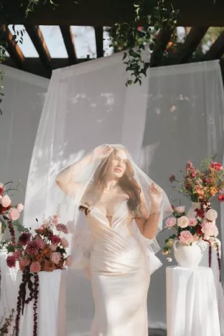 Model poses in the mauve-hued altar space at Hermosa Inn