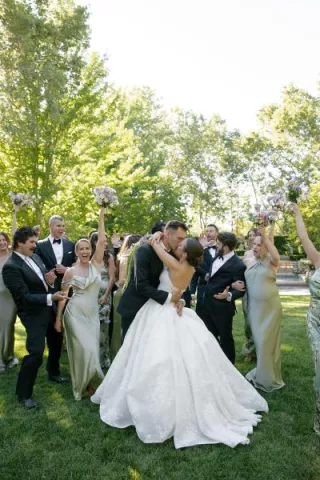 Olivia and Austin Cheered on by Loved Ones as they Kiss in Charming Wedding at Beaulieu Garden