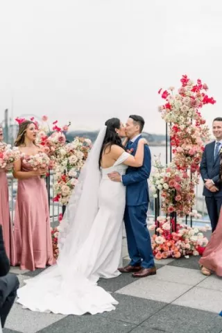 Brilliana and Michael Kiss at the Altar in Seattle Wedding