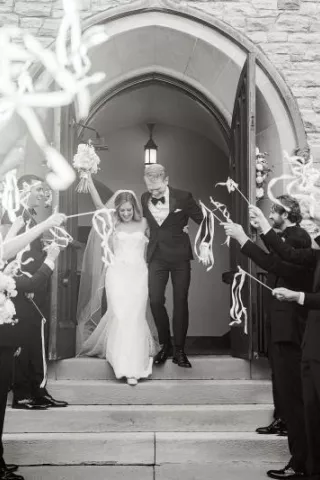 Christina and Dalton exit their ceremony at Lake of the Isles Lutheran Church