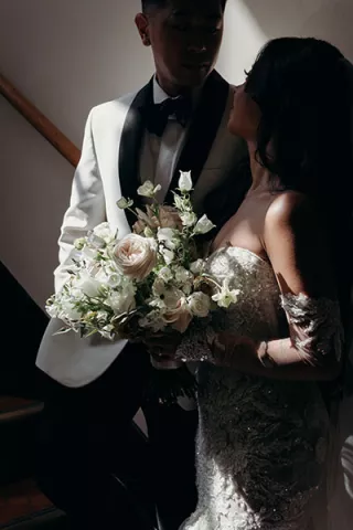 Joyce and Raymond in Dramatic Lighting sharing an Intimate Moment 