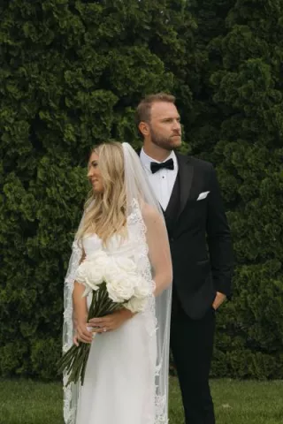 Sadie and Charlie pose on their wedding day