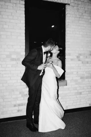 Kara and Jordan share a kiss on their wedding day 