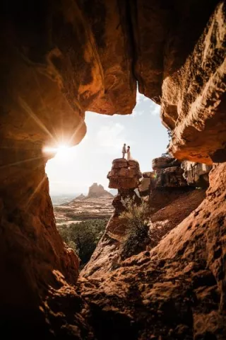 Raynie and Steven framed by Red Rock in Sedona Elopement