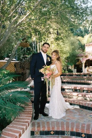 Rachel and Stefano pose at private residence in San Juan Capistrano wedding day