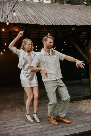 Marjean and Dan start the dancing in their reception attire at Loloma Lodge