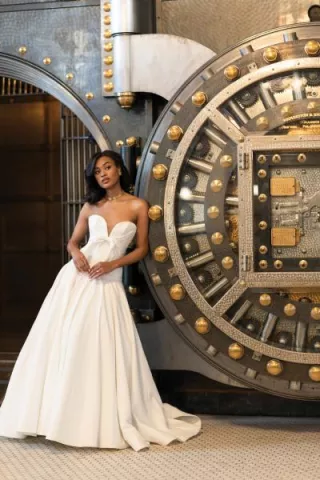 Model poses in trendy wedding gown at The Society