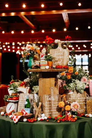 Abundant seating chart design featuring produce infused florals at Essence Event Center