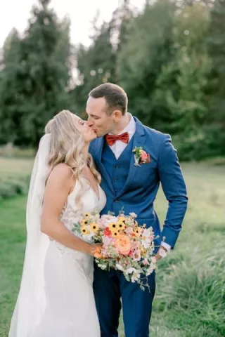 Haley and Matthew Share a Kiss on their Wedding Day at Mountain Springs Lodge
