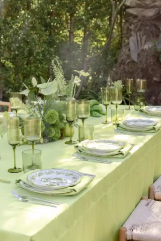 Green monochromatic tablescape featuring peppers and pears in wedding inspiration shoot at Royal Palms Resort and Spa
