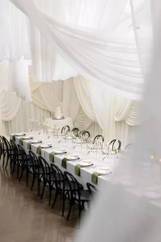 Dramatic Draping and a Dirty Martini Tower Fosters Intimate, Elegant Atmosphere at Rava Wines