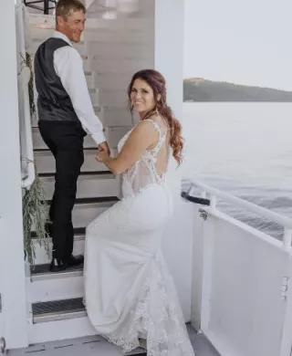 Happy Couple Smiles on the Gull Lake Cruises for their Wedding