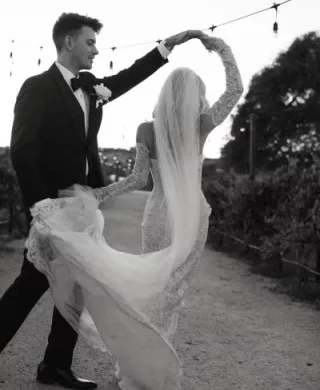 Dillon twirls Brittany on the grounds of Cass Winery