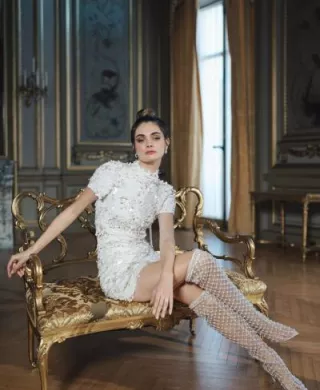 Model Poses Showing Off Bella Belle's Newest Bridal Collection