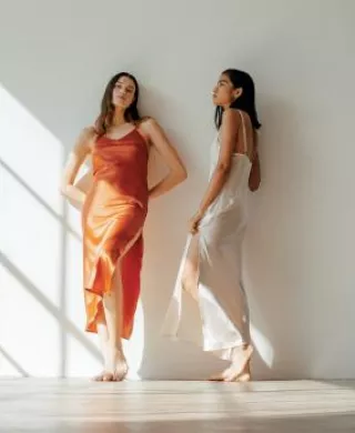 Two Models Pose in The Ruby Dress by Vincente