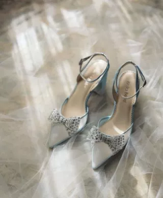Model and pair of silver bridal Bella Belle Shoes from the Champagne Era collection