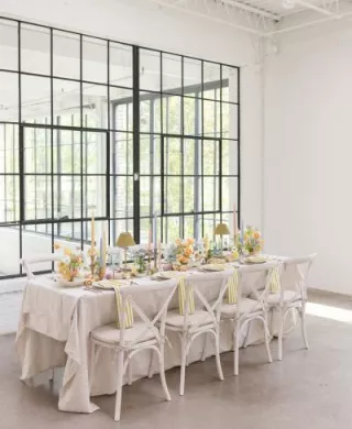 Light and airy tablescape featuring a palette of soft pastels, local blooms and vegetable details at The Whim