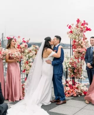 Brilliana and Michael Kiss at the Altar in Seattle Wedding