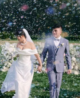 Bride and groom descend back down the aisle at North Fork Farm