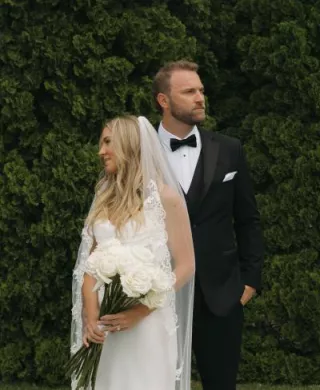 Sadie and Charlie pose on their wedding day