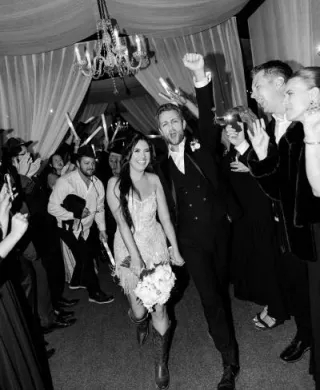 Bride and groom make their grand exit in fashion-forward wedding day at Ever After Ranch