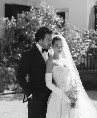 Ariel and Kiefer pose on the grounds of Stonepine Estate in their wedding day attire