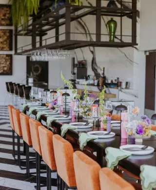 Modern and funky imagined reception scene featuring pastel hues at District Wine Bar