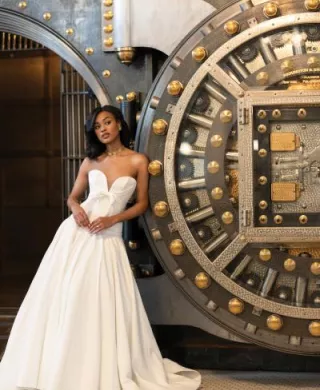 Model poses in trendy wedding gown at The Society