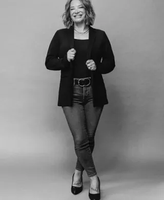 Black and white headshot of Minnesota Bride Publisher Brook Beise