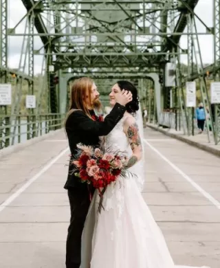 Brittany and Daryian Share an Intimate Moment Post-Wedding on the Stillwater Lift Bridge