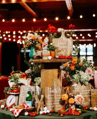 Abundant seating chart design featuring produce infused florals at Essence Event Center