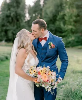 Haley and Matthew Share a Kiss on their Wedding Day at Mountain Springs Lodge