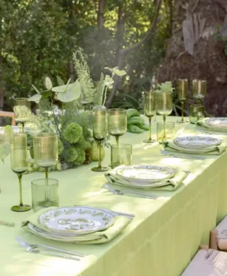 Green monochromatic tablescape featuring peppers and pears in wedding inspiration shoot at Royal Palms Resort and Spa