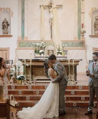 Sadie and Jack kiss at the altar after exchanging vows