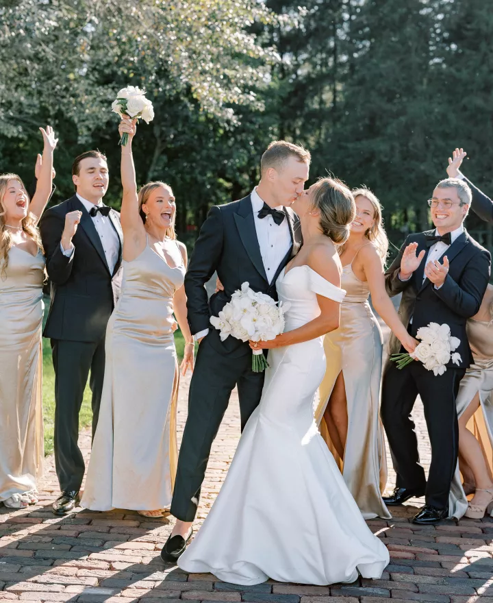 Muted colors at romantic September wedding make lush greenery and surrounding nature pop