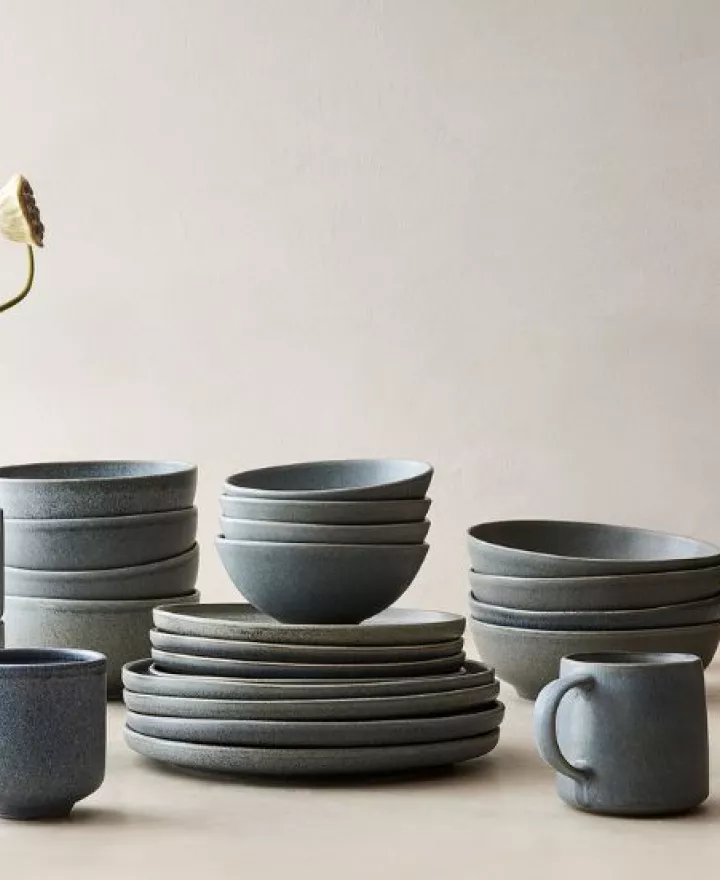 Collage of three earth toned products, earrings, tableware and clutch