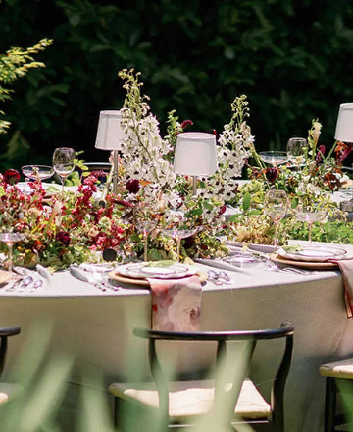 Luxe tablescape pairing hyper-seasonal blooms and rich textures in yin-yang inspired design at Parties on the Terrace
