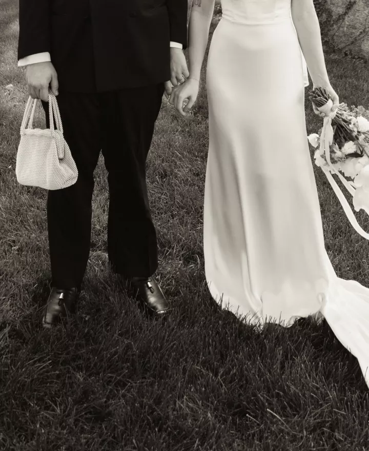 Bottom half of Addie and Walker's wedding day ensembles, in black and white