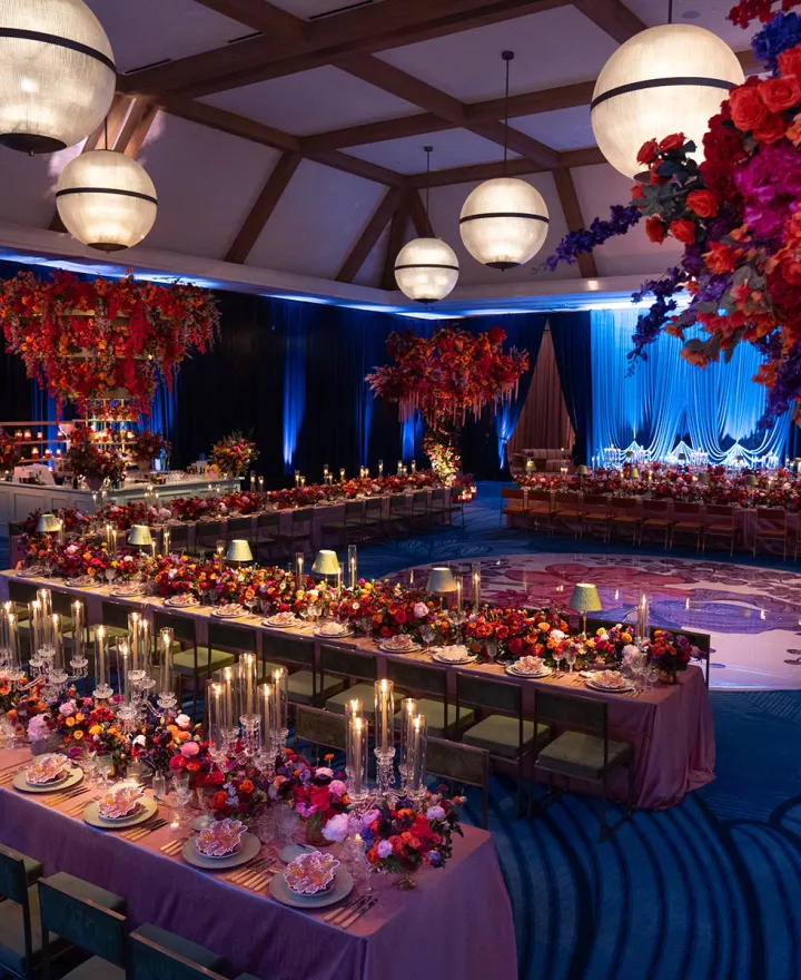 Award-winning jewel-toned reception scene at Hotel del Coronado
