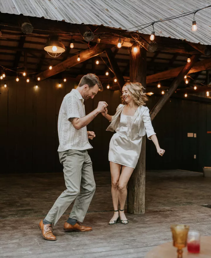 Marjean and Dan start the dancing in their reception attire at Loloma Lodge