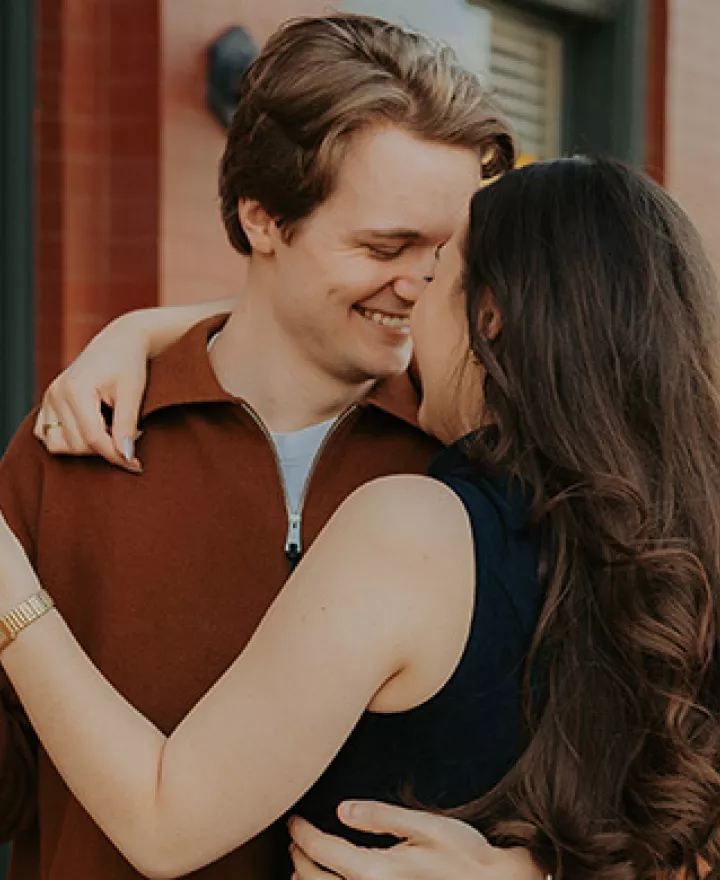 Olivia and Erik share a tender moment dancing during their engagement session with Caitlin & Camera