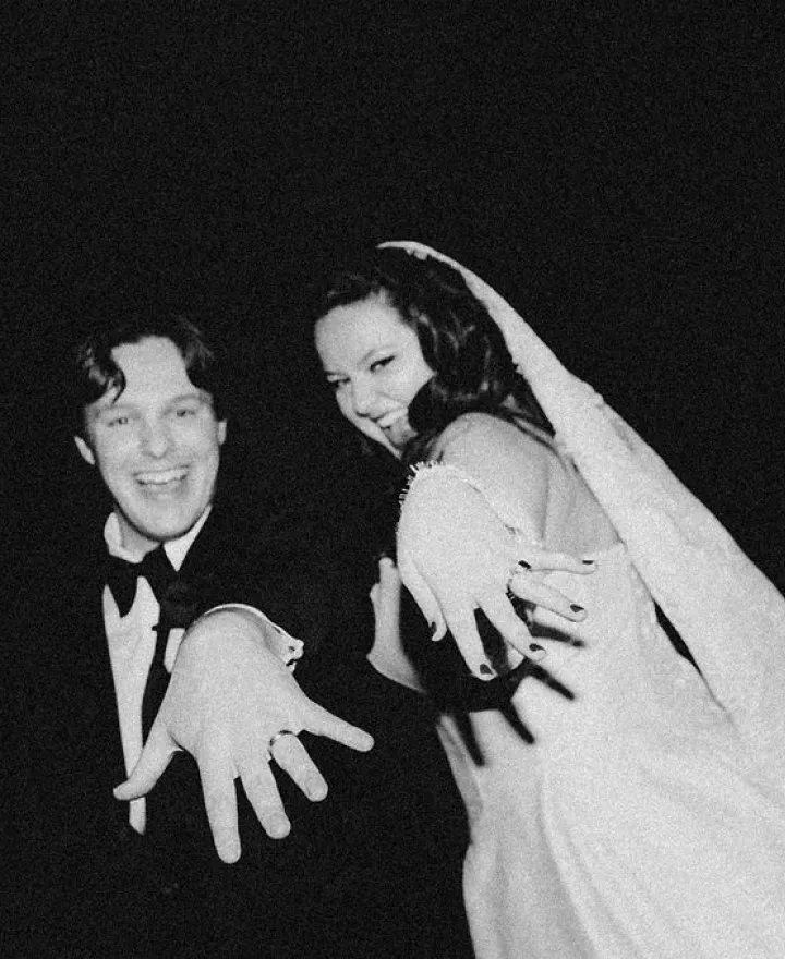 Lauren and Drew pose showing off their rings at Le Veneré